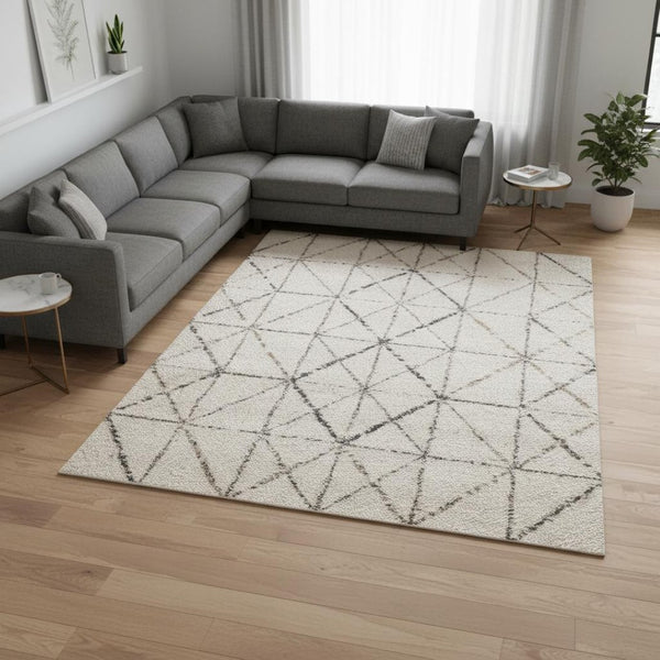 HomeRoots 5' Cream and Gray Tribal Area Rug – Soft, Durable Design for Modern Living Spaces and Families 8' X 11' 660278