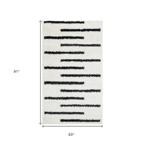 HomeRoots 5' Modern Cream and Black Striped Area Rug - Stain-Resistant, Soft, Durable, Ideal for High-Traffic Homes 5' X 8' 660325