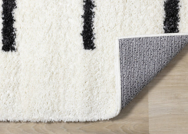 HomeRoots 5' Modern Cream and Black Striped Area Rug - Stain-Resistant, Soft, Durable, Ideal for High-Traffic Homes 5' X 8' 660325