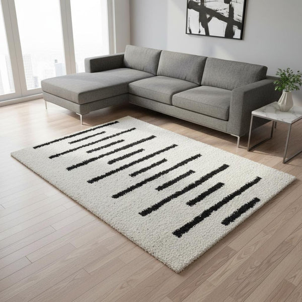 HomeRoots 5' Modern Cream and Black Striped Area Rug - Stain-Resistant, Soft, Durable, Ideal for High-Traffic Homes 8' X 11' 660326