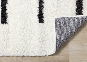 HomeRoots 5' Modern Cream and Black Striped Area Rug - Stain-Resistant, Soft, Durable, Ideal for High-Traffic Homes 8' X 11' 660326