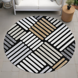 HomeRoots 8' Round Geometric Area Rug in Black, Beige & Ivory - Washable for Indoor/Outdoor Versatility! 660387