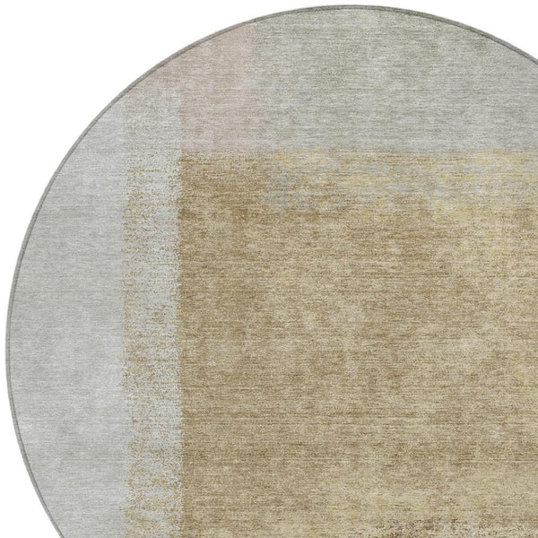 HomeRoots 8' Modern Gold, Ivory & Gray Round Abstract Washable Area Rug for Indoor/Outdoor Elegance & Durability 660495