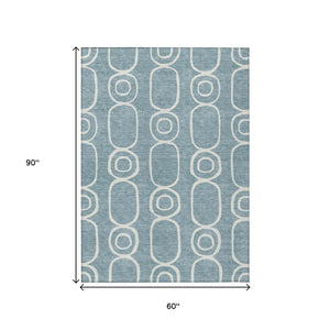 HomeRoots 5' Aqua and Ivory Geometric Area Rug - Washable, Durable, Modern Design for Indoor/Outdoor Use 660602