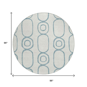 HomeRoots 8' Teal Blue and Ivory Round Geometric Area Rug - Stylish, Durable, Washable for Indoor & Outdoor Use 660645