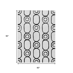 HomeRoots 5' X 8' Stylish Black and White Geometric Washable Area Rug - Perfect for Indoor or Outdoor Spaces! 660650