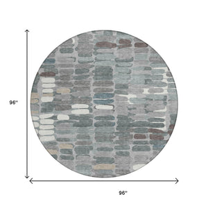 HomeRoots 8' Round Abstract Area Rug in Gray, Ivory, and Pewter – Stylish, Washable, Indoor/Outdoor Versatile Design 660909