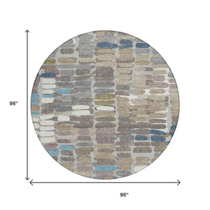HomeRoots 8' Contemporary Round Abstract Area Rug in Taupe, Ivory & Blue - Washable for Indoor/Outdoor Use 660915