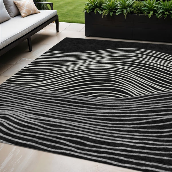 HomeRoots 5' X 8' Stylish Black, Ivory, and Gray Striped Washable Area Rug for Indoor & Outdoor Spaces 660944