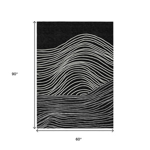 HomeRoots 5' X 8' Stylish Black, Ivory, and Gray Striped Washable Area Rug for Indoor & Outdoor Spaces 660944