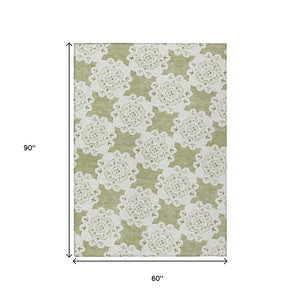 HomeRoots 5' Quatrefoil Area Rug in Artichoke Green & Ivory – Washable, Durable for Indoor/Outdoor Elegance 661022