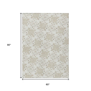 HomeRoots 5' X 8' Beige And Ivory Quatrefoil Area Rug - Stylish, Durable, Washable for Indoor & Outdoor Spaces 661028