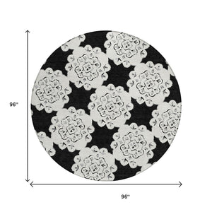 HomeRoots 8' Black and Ivory Round Quatrefoil Rug - Washable, Stain-Resistant, Perfect for Indoor & Outdoor Use 661035