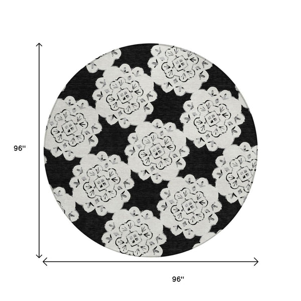HomeRoots 8' Black and Ivory Round Quatrefoil Rug - Washable, Stain-Resistant, Perfect for Indoor & Outdoor Use 661035