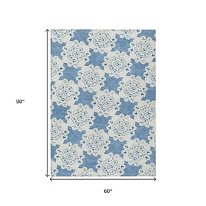 HomeRoots 5' X 8' Blue and Ivory Quatrefoil Washable Area Rug - Stylish, Durable Indoor/Outdoor Essential! 661040