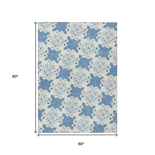 HomeRoots 5' X 8' Blue and Ivory Quatrefoil Washable Area Rug - Stylish, Durable Indoor/Outdoor Essential! 661040