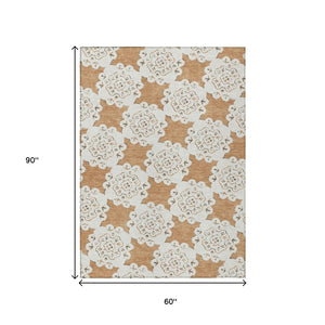 HomeRoots 5' X 8' Copper and Ivory Quatrefoil Rug - Durable, Washable, Stylish for Indoor & Outdoor Spaces! 661046
