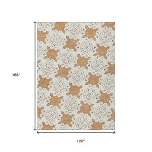 HomeRoots 10' Copper and Ivory Quatrefoil Area Rug - Washable, Durable, Indoor/Outdoor, Pet-Friendly Style! 661050