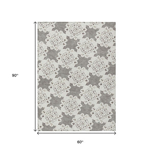 HomeRoots 5' Stylish Taupe and Ivory Quatrefoil Washable Area Rug - Durable, Versatile for Indoor/Outdoor Use! 661064