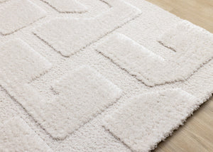 HomeRoots 5' Cream and Ivory Geometric Area Rug - Soft, Stain-Resistant, Modern Style for Cozy Living Spaces 5' X 8' 661267