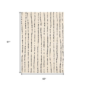 HomeRoots 5' Cream and Black Striped Area Rug - Plush, Durable, Modern Design for Cozy Living Spaces 5' X 8' 661269