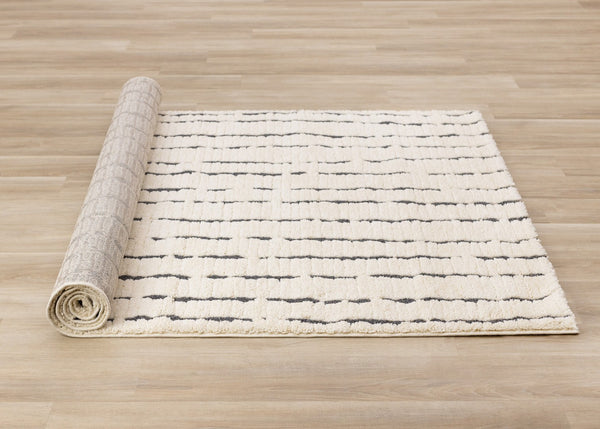 HomeRoots 5' Cream and Black Striped Area Rug - Plush, Durable, Modern Design for Cozy Living Spaces 5' X 8' 661269