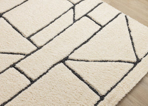 HomeRoots 5' Cream and Black Geometric Area Rug - Soft, Durable, and Stylish Design for Modern Living Spaces 5' X 8' 661271