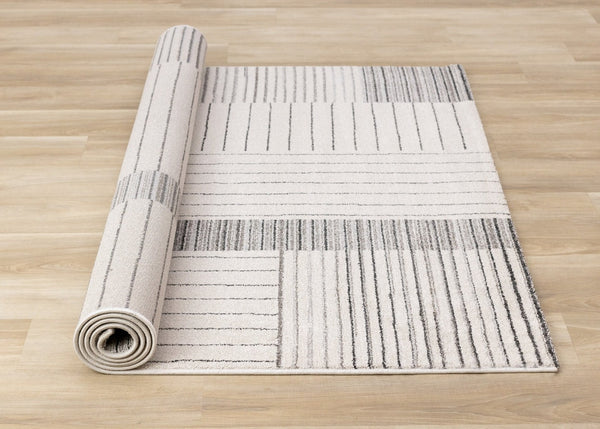 HomeRoots 5' Ivory and Black Striped Area Rug - Durable, Soft, and Stylish Accent for Modern Homes and Spaces 5' X 8' 661278