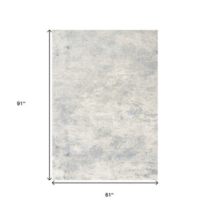 HomeRoots 5' Cream and Blue Abstract Area Rug - Modern Design, Durable, Stain-Resistant, Perfect for High-Traffic Areas 5' X 8' 661318