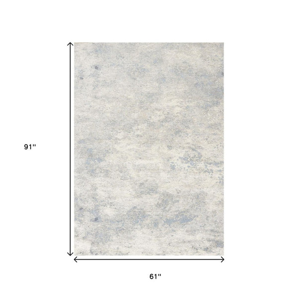 HomeRoots 5' Cream and Blue Abstract Area Rug - Modern Design, Durable, Stain-Resistant, Perfect for High-Traffic Areas 5' X 8' 661318