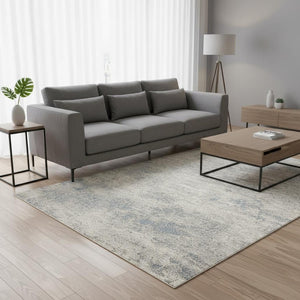 HomeRoots 5' Cream and Blue Abstract Area Rug - Modern Design, Durable, Stain-Resistant, Perfect for High-Traffic Areas 5' X 8' 661318