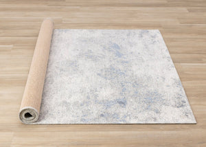 HomeRoots 5' Cream and Blue Abstract Area Rug - Modern Design, Durable, Stain-Resistant, Perfect for High-Traffic Areas 5' X 8' 661318