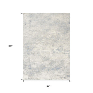 HomeRoots 5' Cream and Blue Abstract Area Rug - Modern Design, Durable, Stain-Resistant, Perfect for High-Traffic Areas 8' X 11' 661319