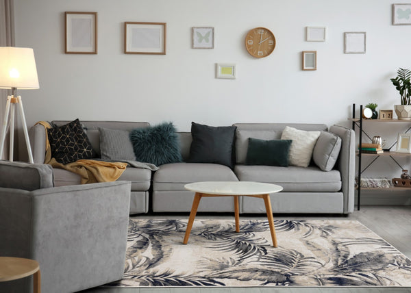 HomeRoots 8' X 11' Cream and Gray Botanical Leaves Area Rug - Modern, Durable Design for High-Traffic Spaces 661346
