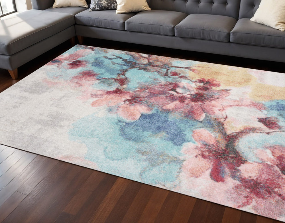 HomeRoots 5' Floral Area Rug in Cream, Blue & Pink - Durable, Easy-Care Design for Every Room's Charm 7' X 10' 661353