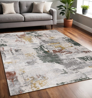 HomeRoots 5' Modern Abstract Area Rug in Gray, Yellow, and Green - Soft, Durable, Stain-Resistant Design 5' X 8' 661371