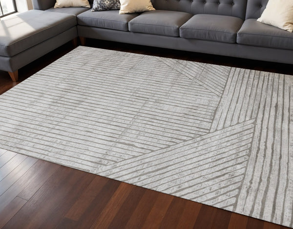 HomeRoots 5' Gray and Off-White Striped Area Rug - Durable, Stain-Resistant Design for Modern Living Spaces 7' X 10' 661384