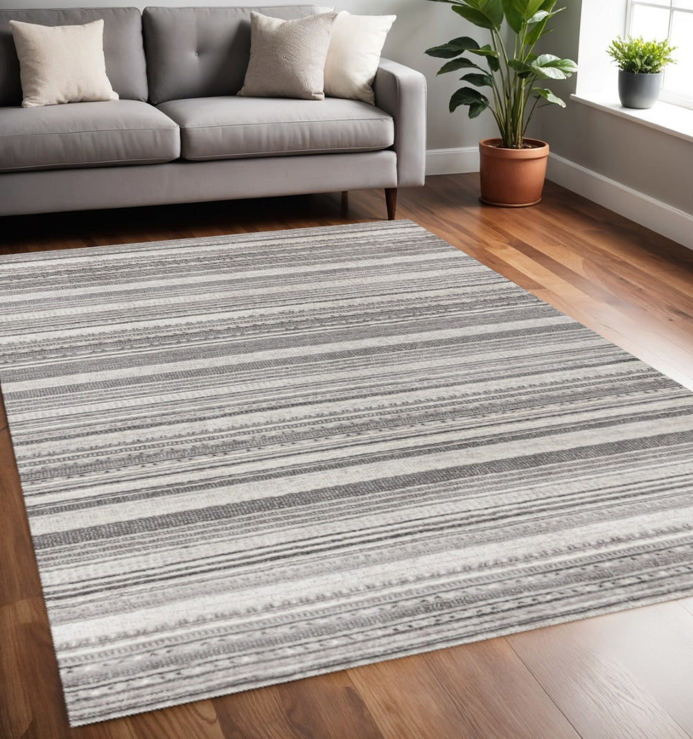 HomeRoots 5' Gray and White Striped Area Rug - Modern, Soft and Stain-Resistant for Living Rooms and More 5' X 8' 661410