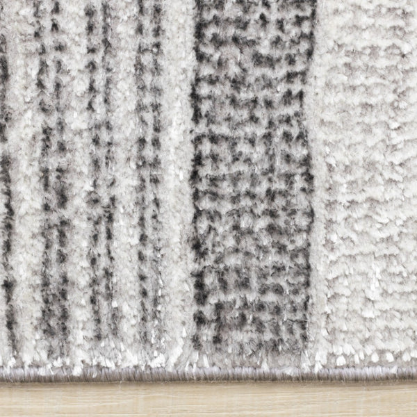 HomeRoots 5' Gray and White Striped Area Rug - Modern, Soft and Stain-Resistant for Living Rooms and More 5' X 8' 661410