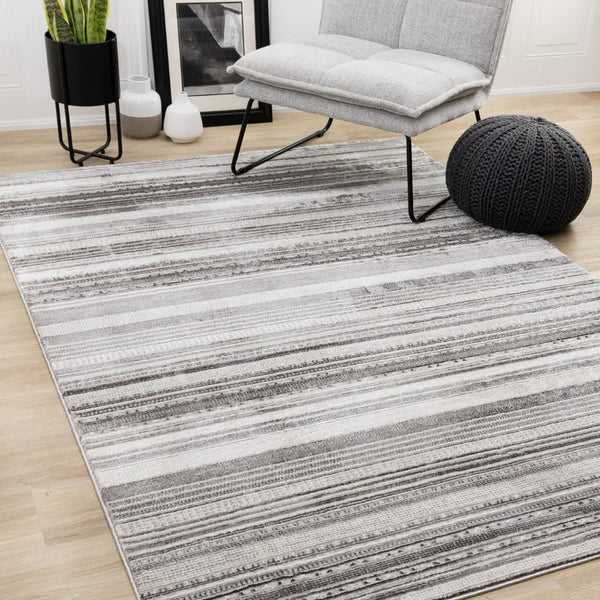 HomeRoots 5' Gray and White Striped Area Rug - Modern, Soft and Stain-Resistant for Living Rooms and More 5' X 8' 661410