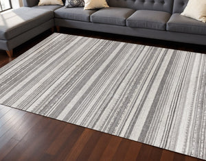 HomeRoots 5' Gray and White Striped Area Rug - Modern, Soft and Stain-Resistant for Living Rooms and More 8' X 11' 661411