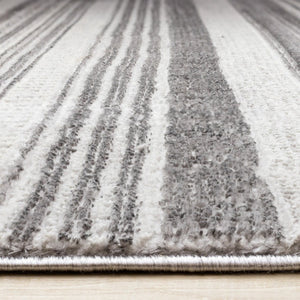 HomeRoots 5' Gray and White Striped Area Rug - Modern, Soft and Stain-Resistant for Living Rooms and More 8' X 11' 661411