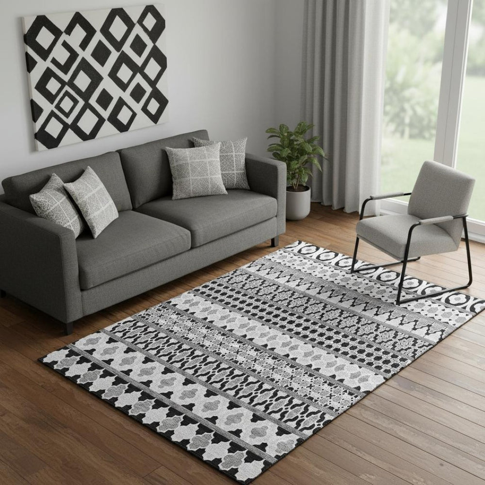HomeRoots 5' X 8' Washable Black and Ivory Ikat Area Rug with UV Protection for High-Traffic Homes & Pets 661421