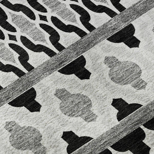 HomeRoots 5' X 8' Washable Black and Ivory Ikat Area Rug with UV Protection for High-Traffic Homes & Pets 661421