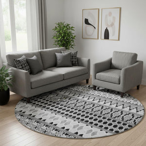 HomeRoots 8' Black And Ivory Ikat Round Rug - Washable, UV Protected, Durable for High-Traffic Homes & Style 661422