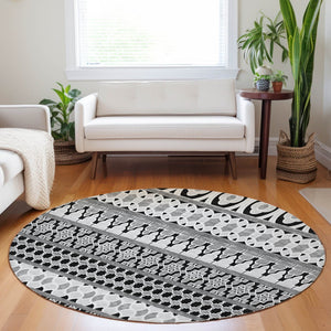 HomeRoots 8' Black And Ivory Ikat Round Rug - Washable, UV Protected, Durable for High-Traffic Homes & Style 661422