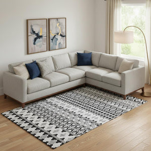 HomeRoots 8' X 10' Ikat Washable Area Rug - Stylish Black & Ivory Design with UV Protection for Busy Homes 661423