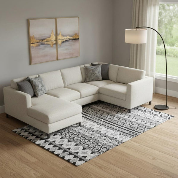 HomeRoots 9' X 12' Black And Ivory Ikat Area Rug - Stylish, Washable, UV-Protected for High-Traffic Spaces 661424