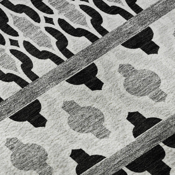 HomeRoots 10' X 14' Ikat Area Rug in Black and Ivory - Washable, UV-Protected, Stain-Resistant for Durability! 661425