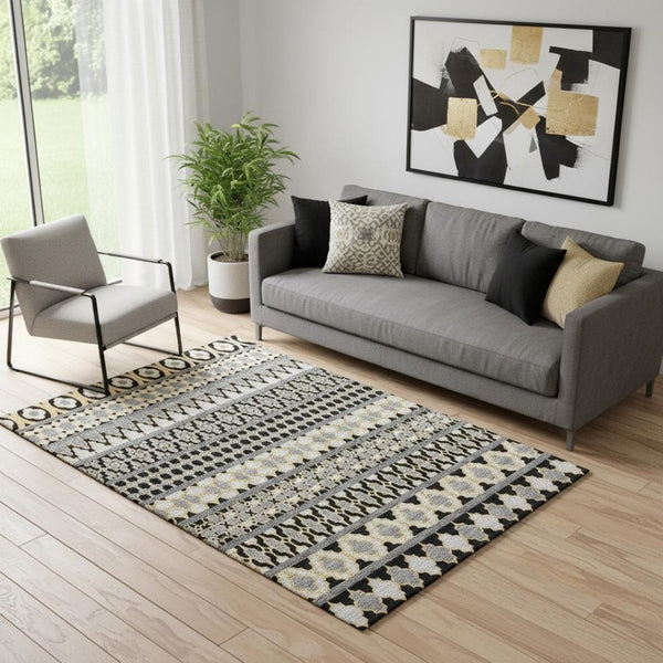 HomeRoots 5' X 8' Modern Charcoal Ivory Copper Ikat Area Rug - Washable, UV Protected, Stain Resistant Design! 661433
